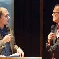 Dagvoorzitter Ruben Maes in gesprek met Rubrecht Zaat, coördinator BKT