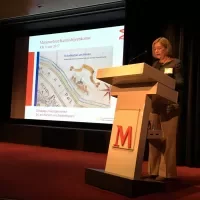 Marg van der Burgh heet de aanwezigen welkom.