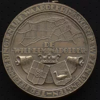 Legpenning Ter herinnering en uit waardering voor bewezen diensten, 'aangeboden aan B.C.D. Hanegraaff, ontwerper van de tekening op de Wilhelminapolder legpenning', 1935. Zeeuws Archief, Koninklijke Maatschap De Wilhelminapolder, toegang 250, inv. nr 1259.
