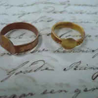 Brief van J. G. Coorengel aan zijn moeder met twee gouden ringen